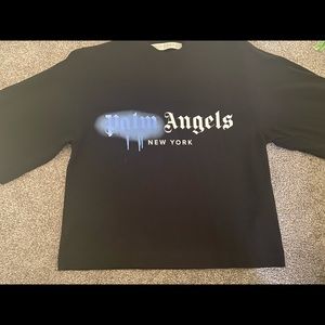 Palm Angles black and blue woman’s t shirt.